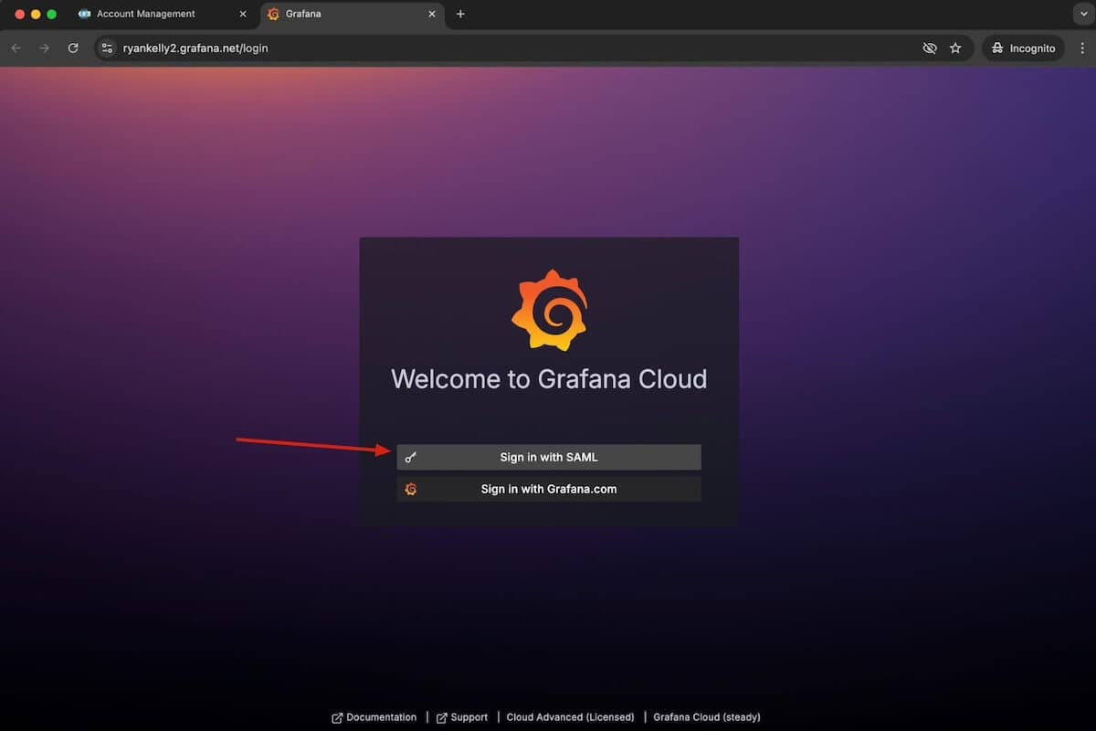 A screenshot of a Grafan Cloud sign-in page with an arrow pointing to the Sign in with SAML option
